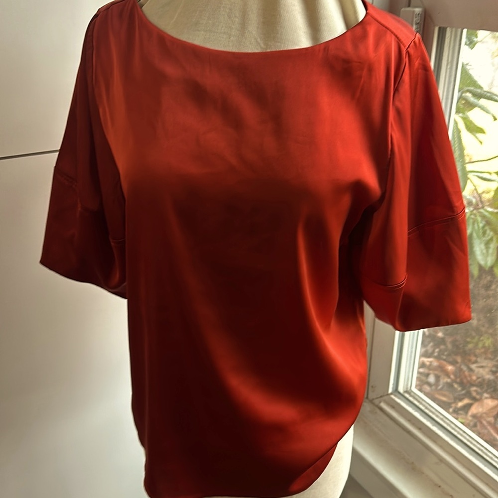 Satin burnt orange size M used a once.
